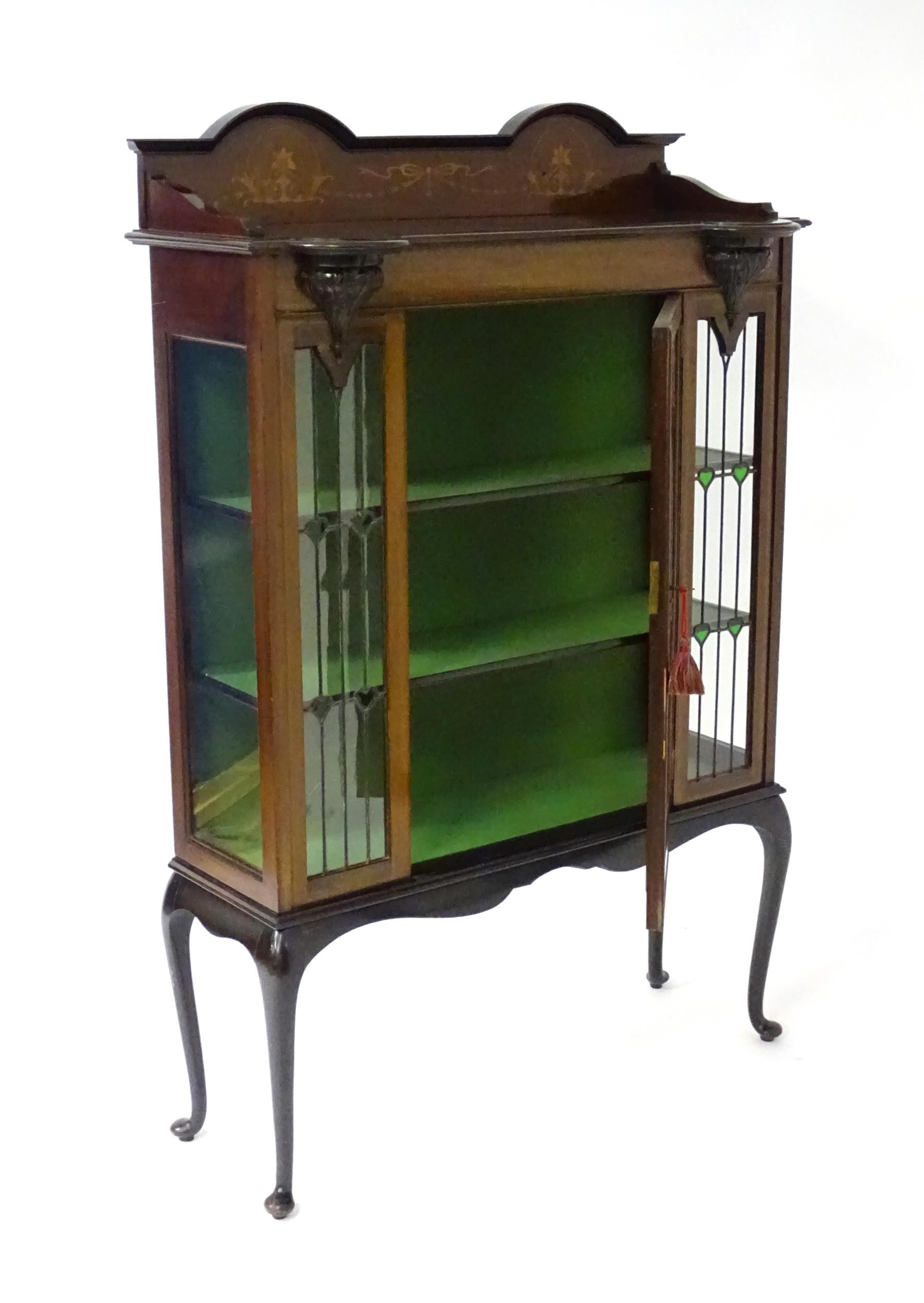 An Edwardian mahogany display cabinet with leaded glass panelling, stained glass panels and a - Image 4 of 12