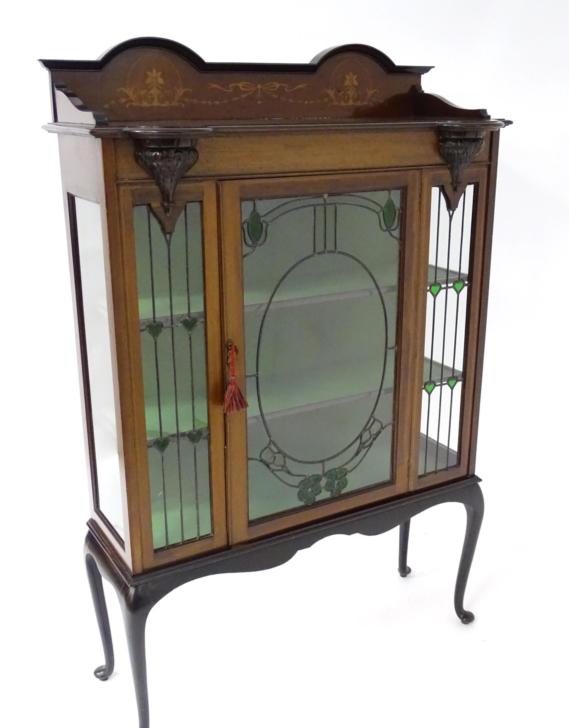 An Edwardian mahogany display cabinet with leaded glass panelling, stained glass panels and a - Image 3 of 12