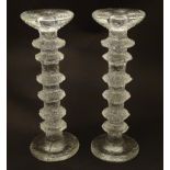 Finnish Art Glass: A pair of Iittala glass candlesticks. 9 3/4" high Please Note - we do not make