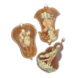 Three Oriental wall plaques of fan form each depicting a figure. Largest approx. 12 1/4" long (3)