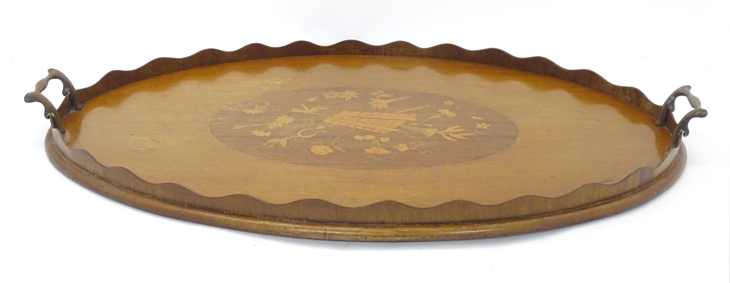 A late 19th / early 20thC mahogany tray of oval form with twin handles and central floral and - Image 5 of 5