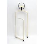 A late 20thC modernist dressing stand, the tray marked 'norda', standing 49" tall Please Note - we