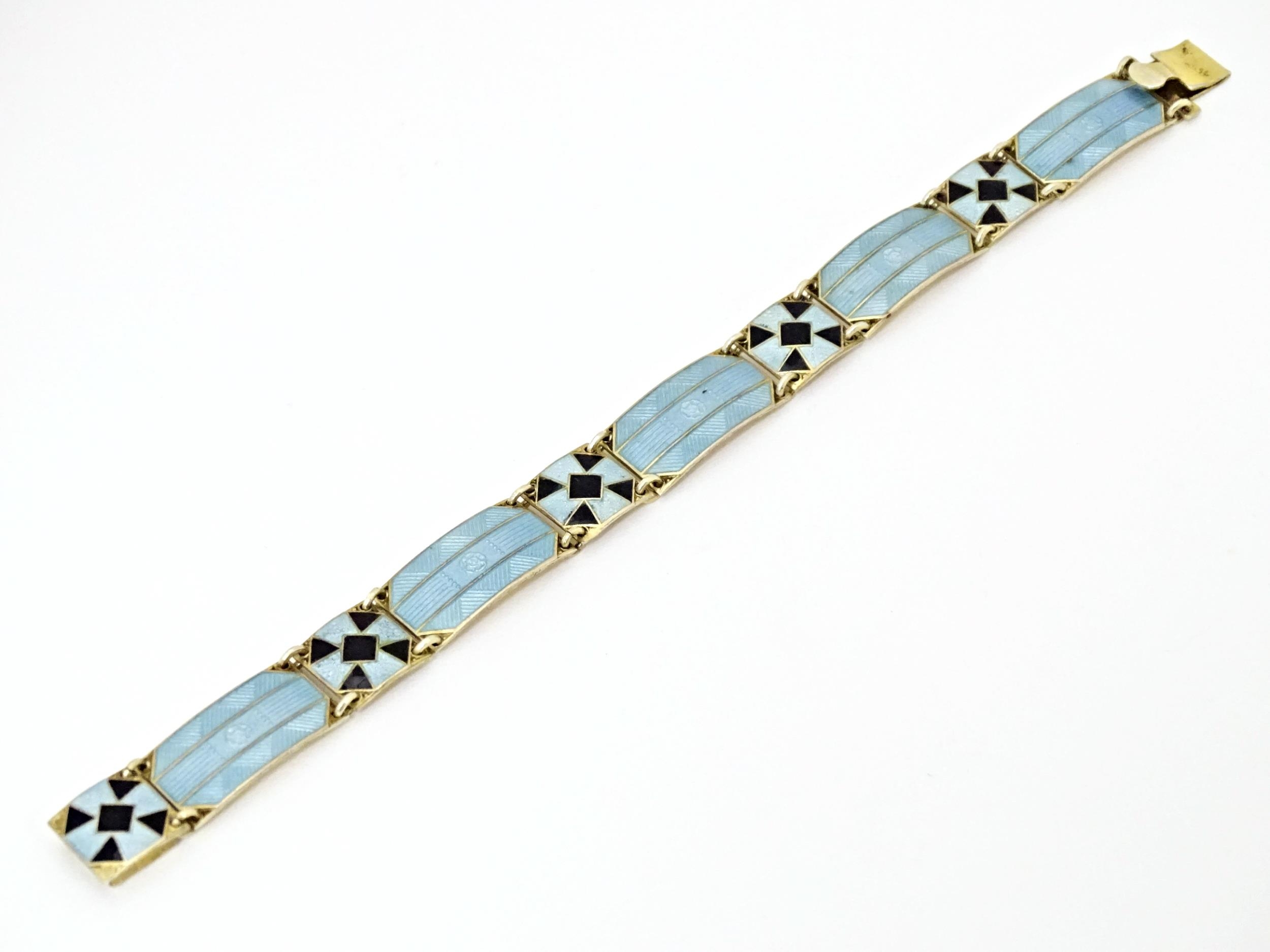 Scandinavian jewellery: A Swedish silver gilt bracelet with pale blue and black guilloche enamel