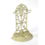 A Victorian cast iron stick stand, of arch and demi lune form with painted finish, decorated with