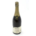 Champagne : a 20thC 75cl bottle of Renaudin Bollinger & Co special cuvee, the bottle approx 12" tall