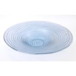 A pale blue glass bowl with swirl detail. Approx 19" diameter Please Note - we do not make reference