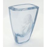 A Swedish Art glass vase by Strombergshyttan. Decorated with image of a girl with a bird. Signed and