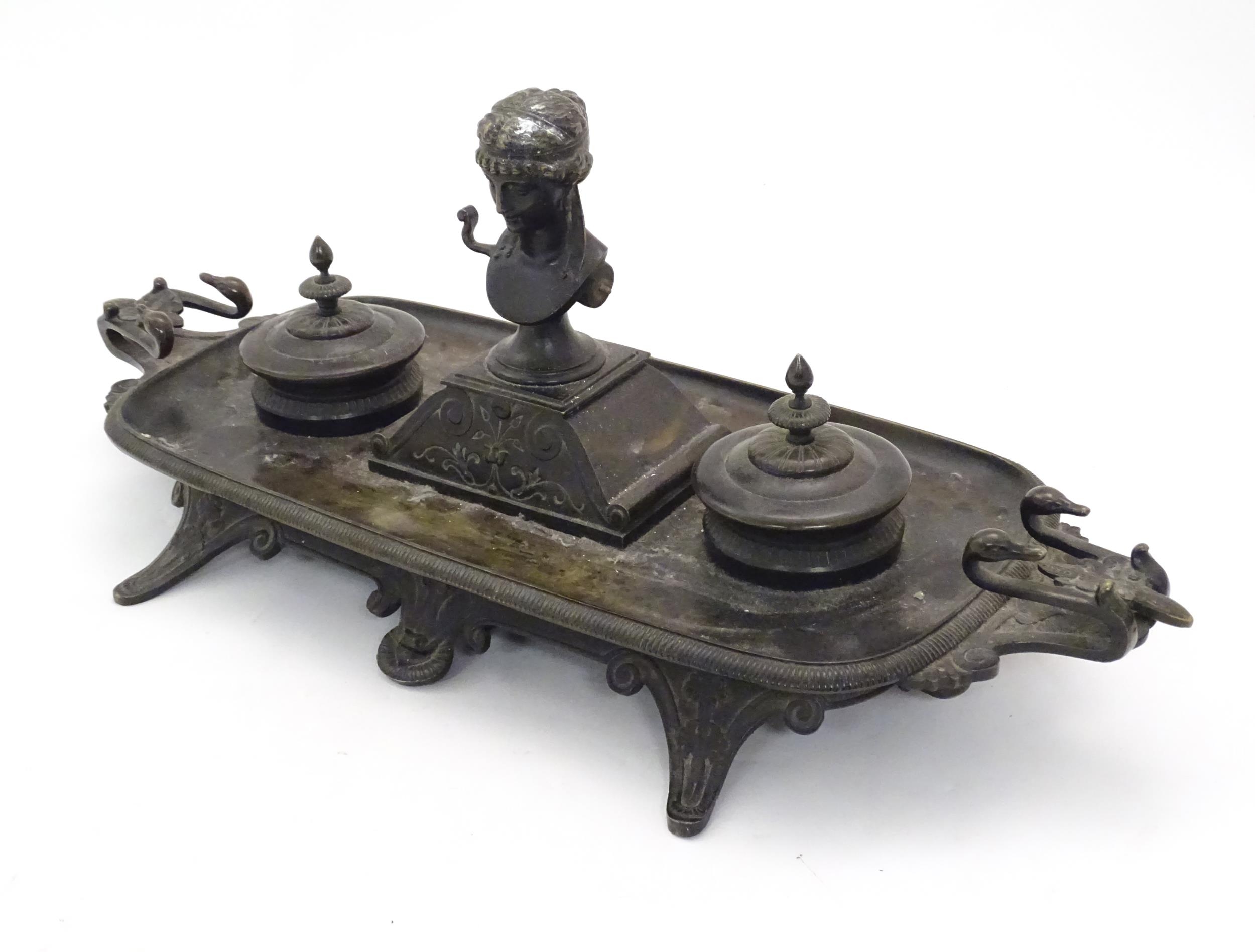 A 19thC Continental bronze desk standish with twin handles modelled with swan heads, the central - Image 4 of 7