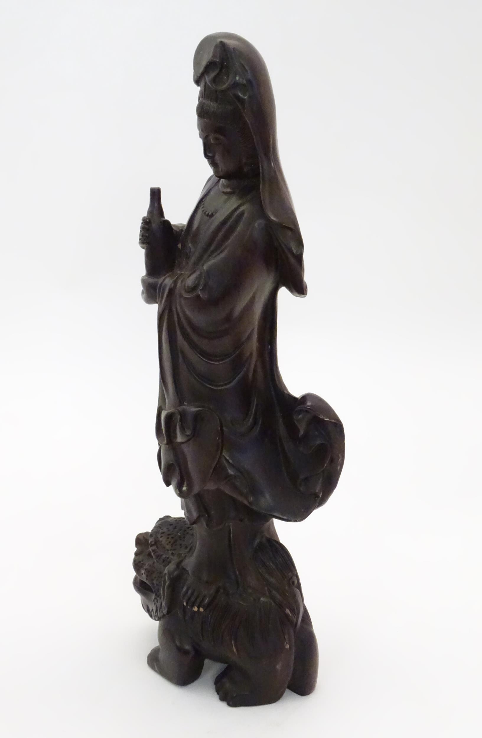 A Chinese carved hardwood model of Guanyin, Bodhisattva of Compassion, holding a bottle and standing - Image 4 of 6