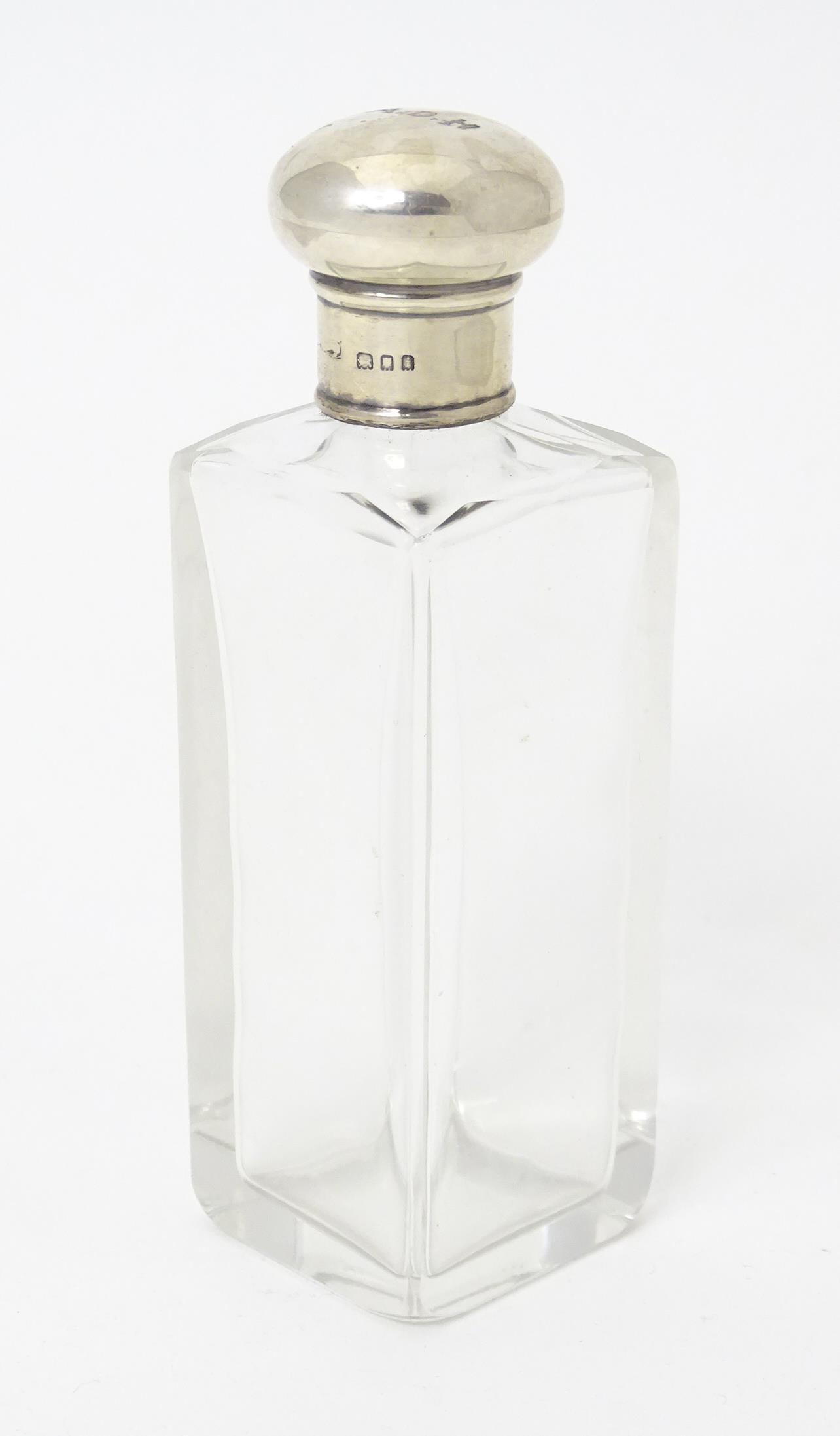 A glass dressing table jar of squared form with silver lid hallmarked London 1924. Approx. 5 1/4" - Image 3 of 6