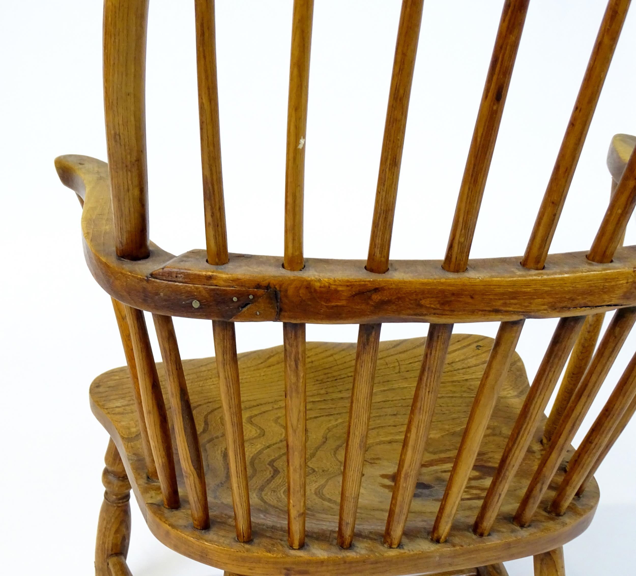 An early / mid 19thC Windsor chair of ash, elm and beech construction, having a double bow back, - Image 9 of 9