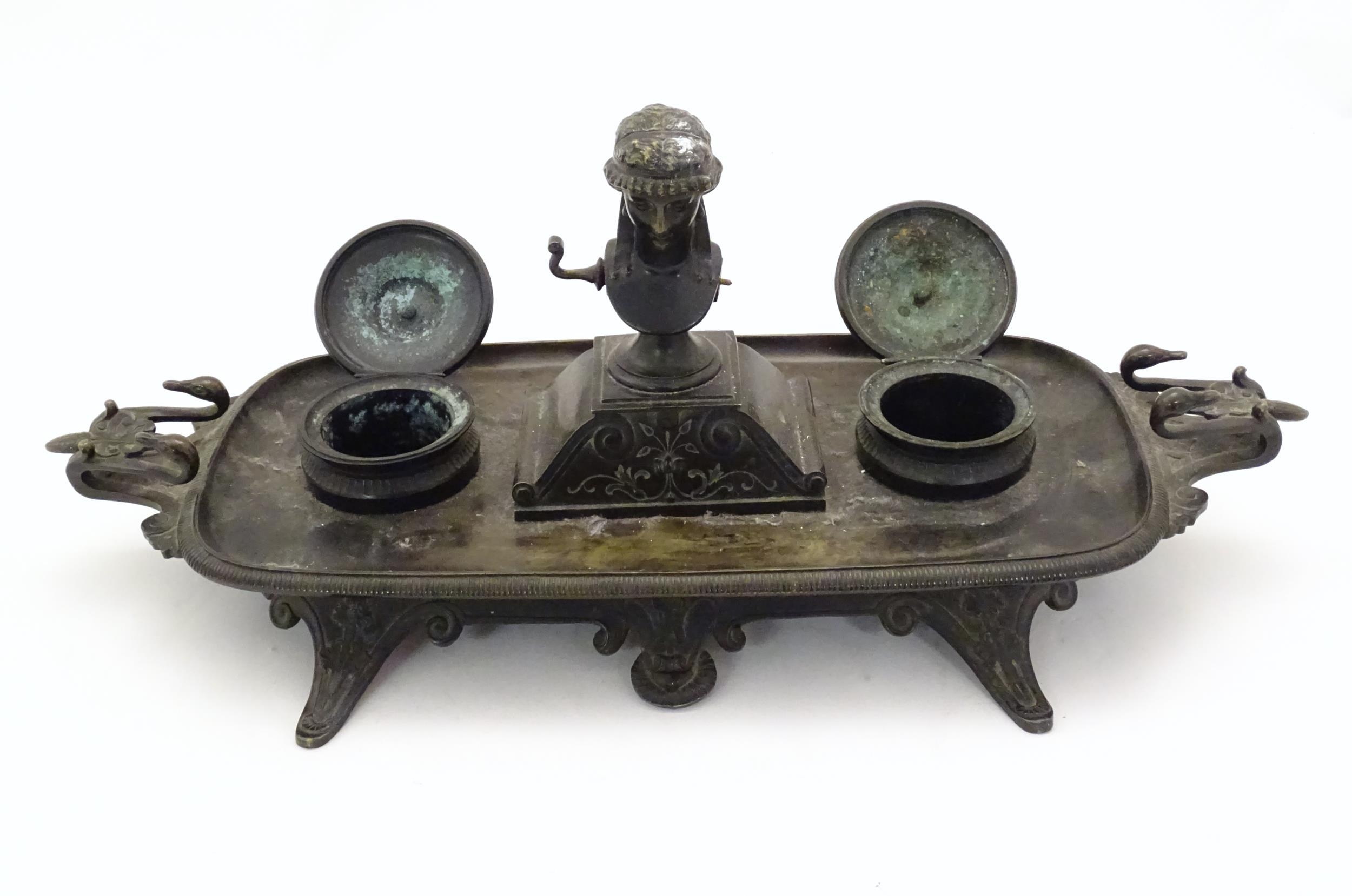 A 19thC Continental bronze desk standish with twin handles modelled with swan heads, the central - Image 6 of 7