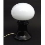 A black glass table lamp with white glass shade of mushroom form, marked Rosenthal studio linie