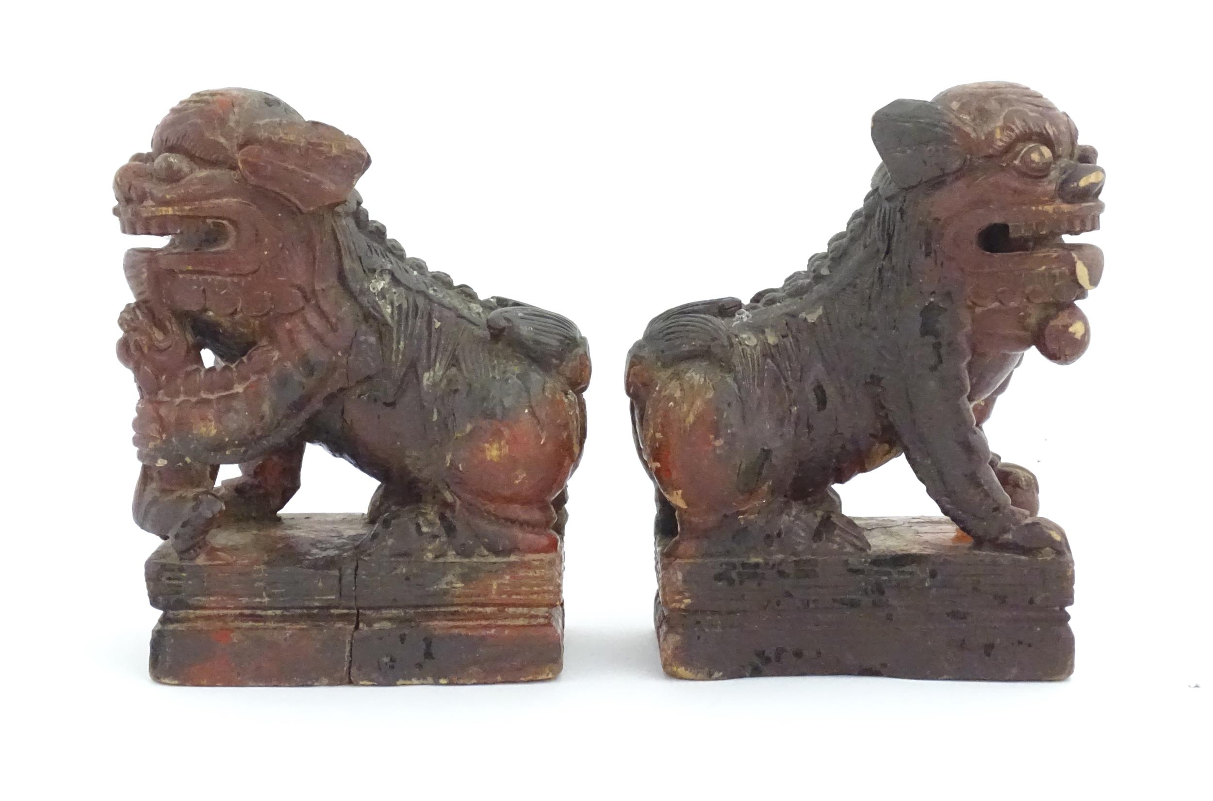 Two Chinese carved wooden foo dogs / guardian lions, one with a cub, the other with a ball, with - Image 3 of 9