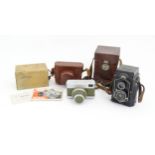 Two 20thC cameras to include a cased Carl Zeiss Jena Werra camera, with box, instruction booklet and