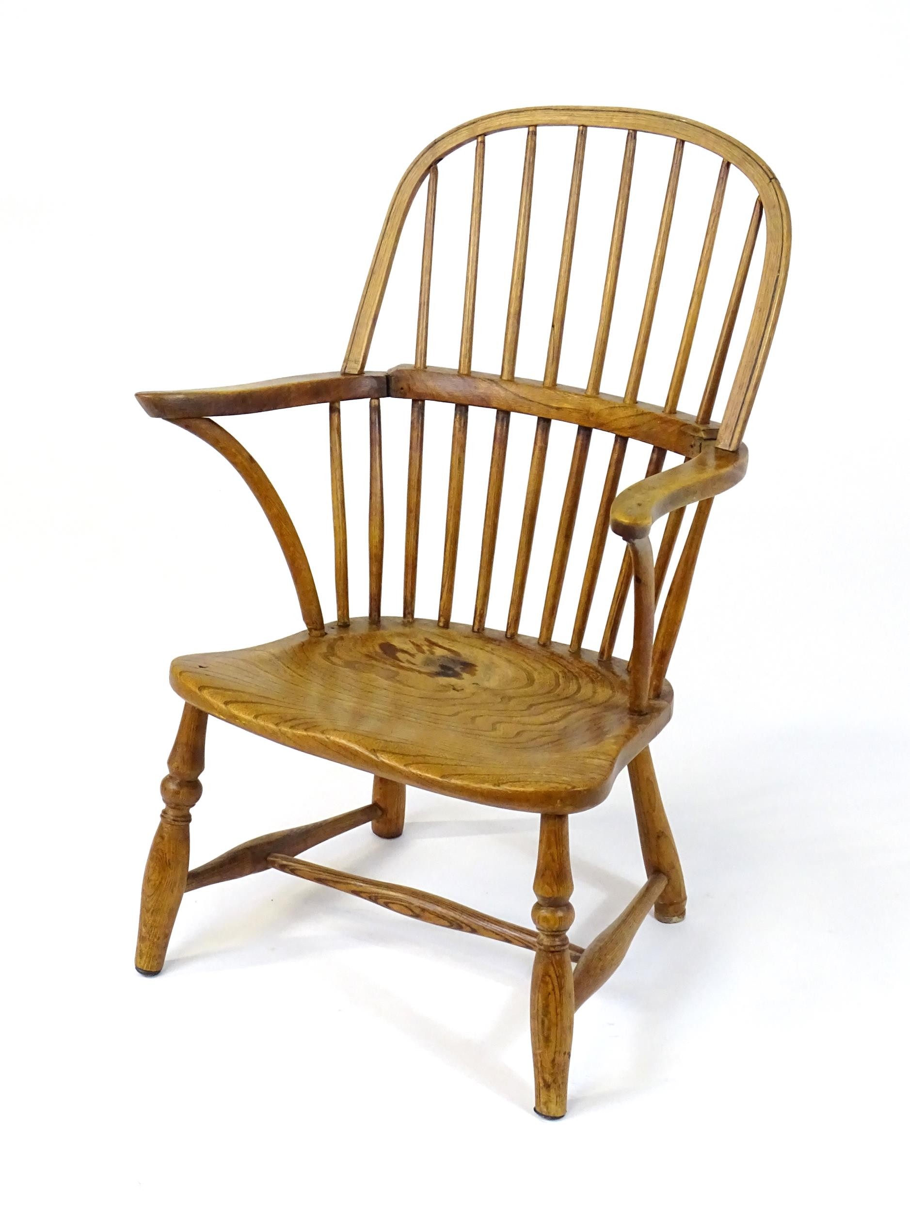 An early / mid 19thC Windsor chair of ash, elm and beech construction, having a double bow back, - Image 4 of 9