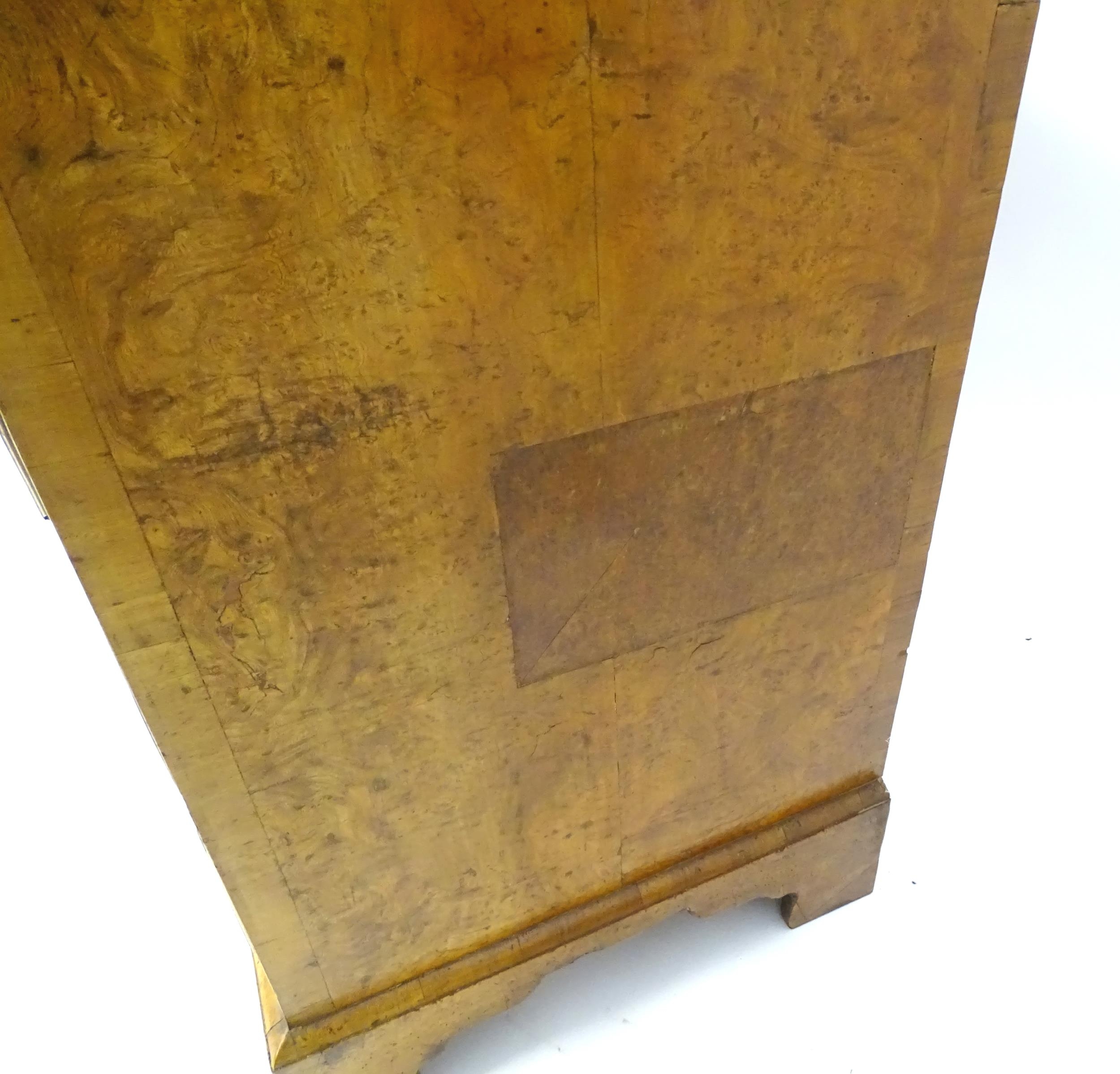 A George III walnut chest of drawers, the chest having a crossbanded top above three short over - Image 12 of 12