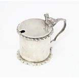 A Victorian silver mustard pot with blue glass liner, hallmarked London 1897, maker George Fox