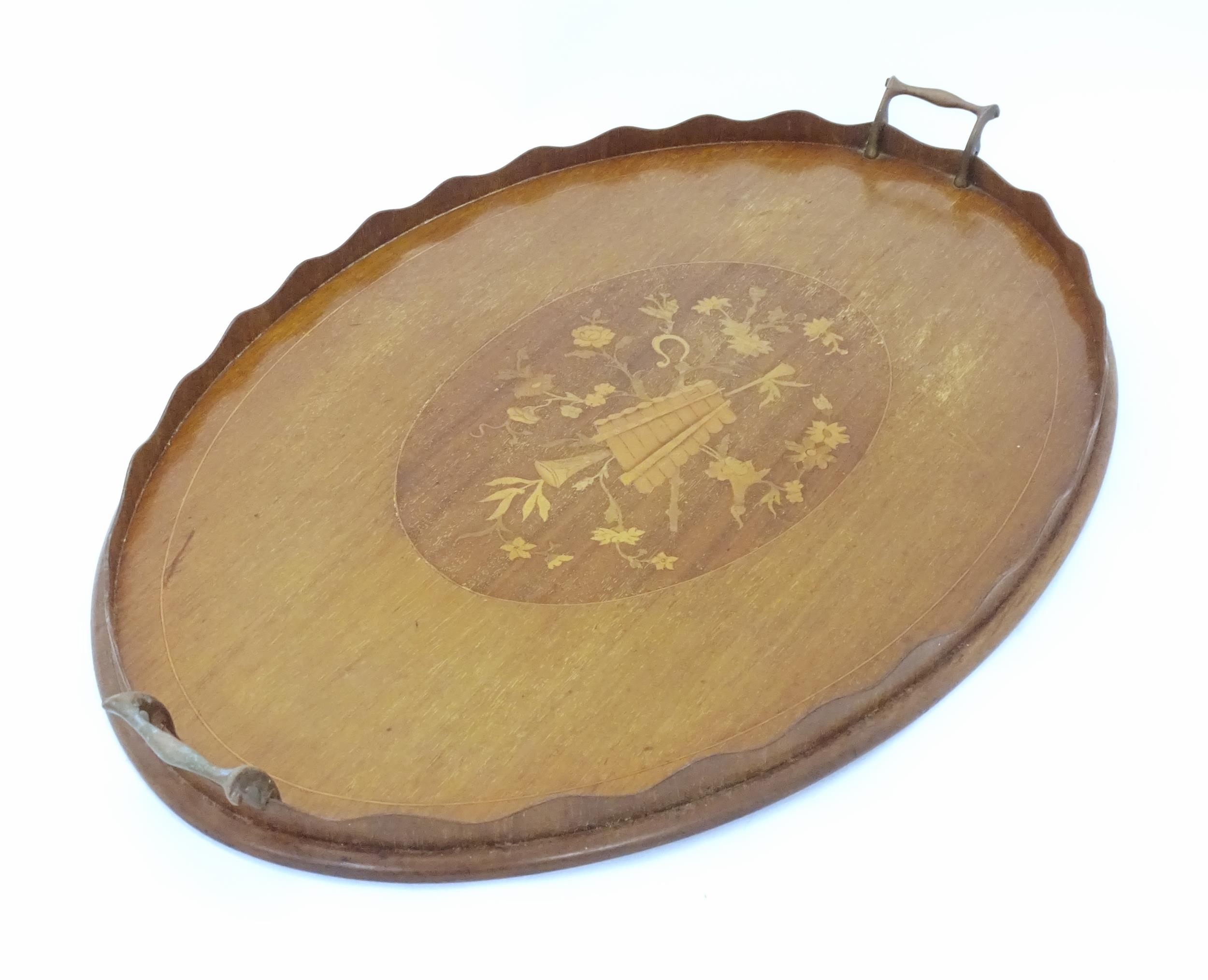 A late 19th / early 20thC mahogany tray of oval form with twin handles and central floral and - Image 4 of 5