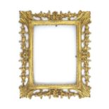 A 20thC Florentine style pierced giltwood frame. Approx. 13 1/2" x 11" overall Please Note - we do