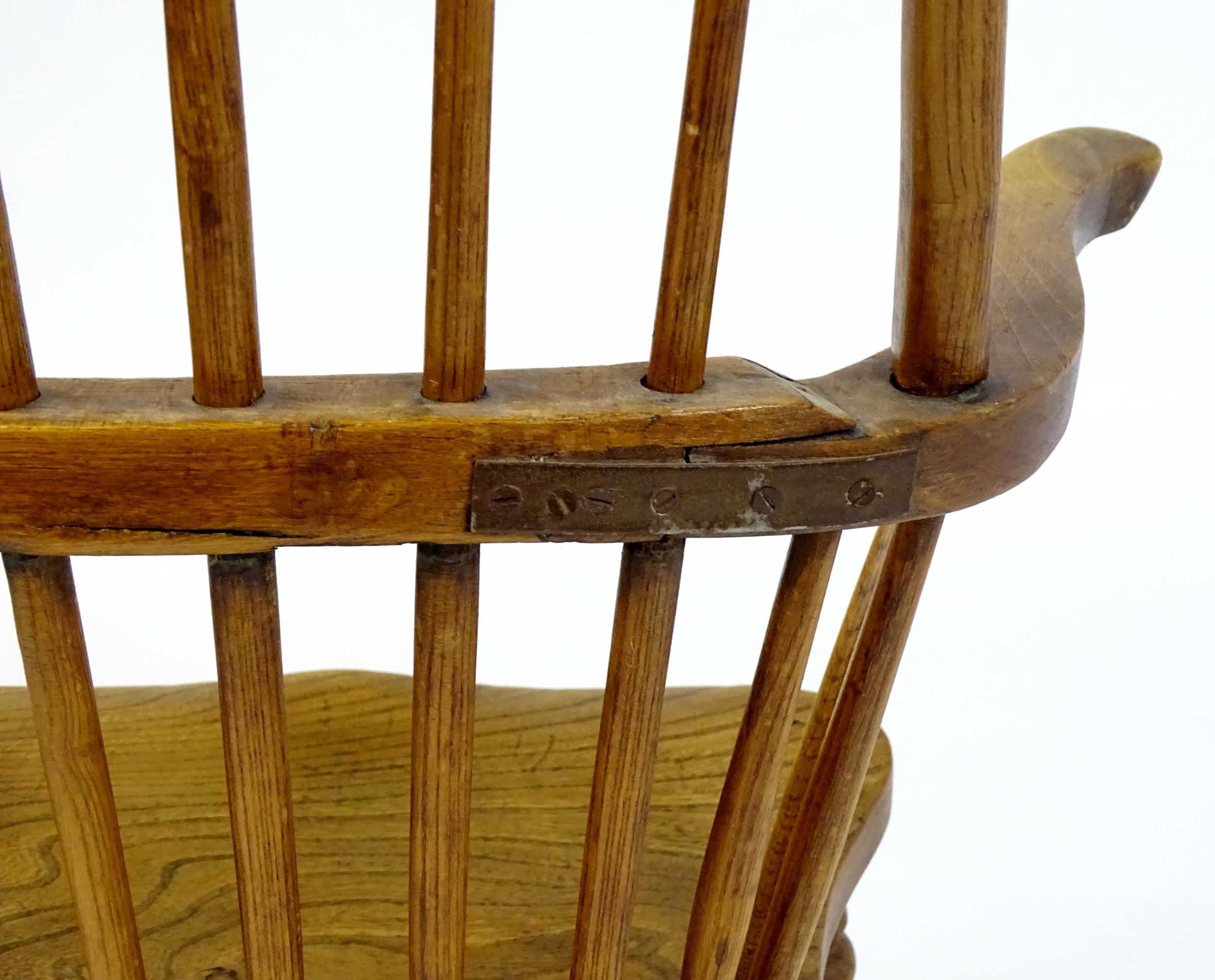 An early / mid 19thC Windsor chair of ash, elm and beech construction, having a double bow back, - Image 8 of 9