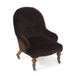 A Victorian salesman sample chair / child's chair , with an iron frame, deep buttoned backrest and