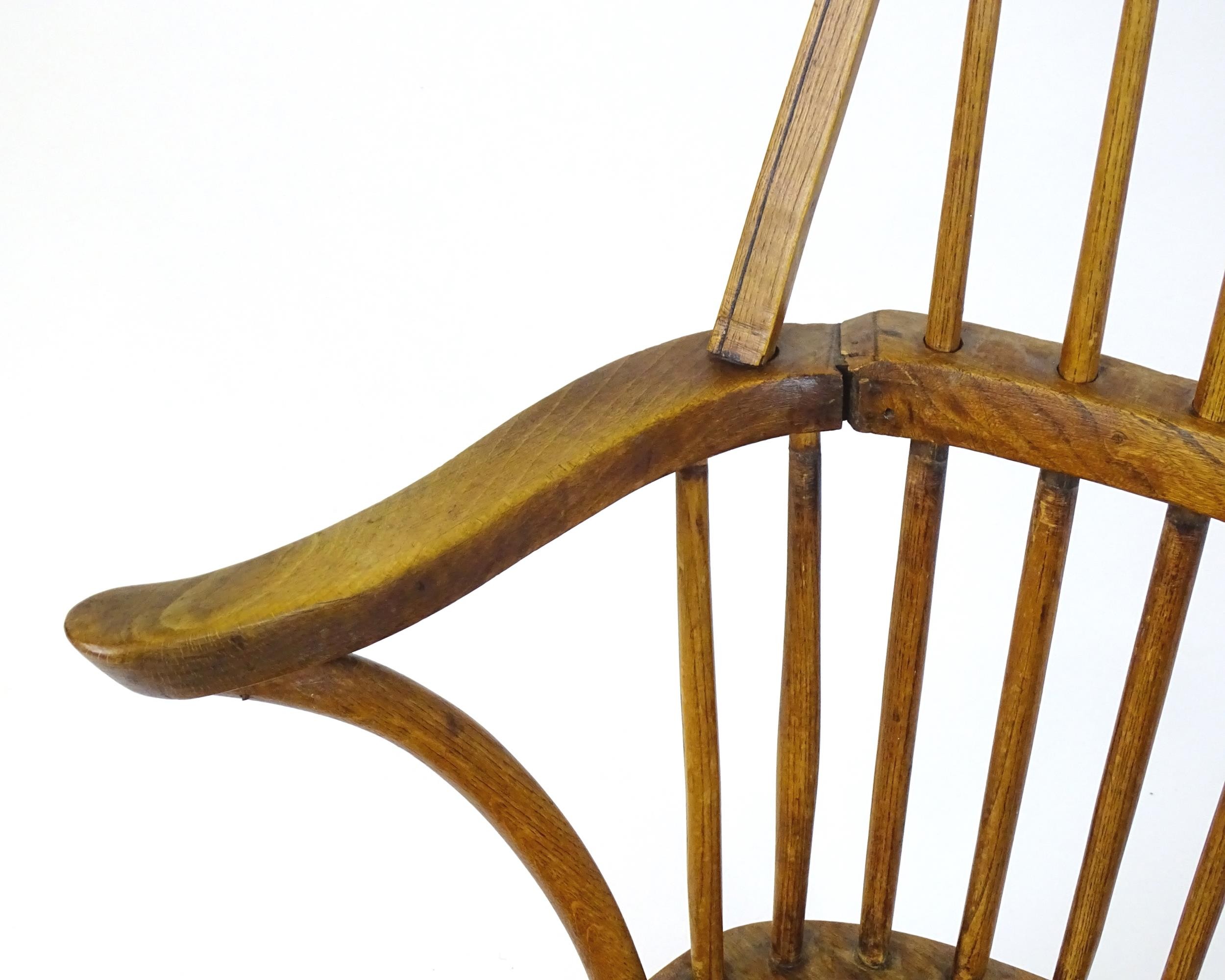 An early / mid 19thC Windsor chair of ash, elm and beech construction, having a double bow back, - Image 5 of 9