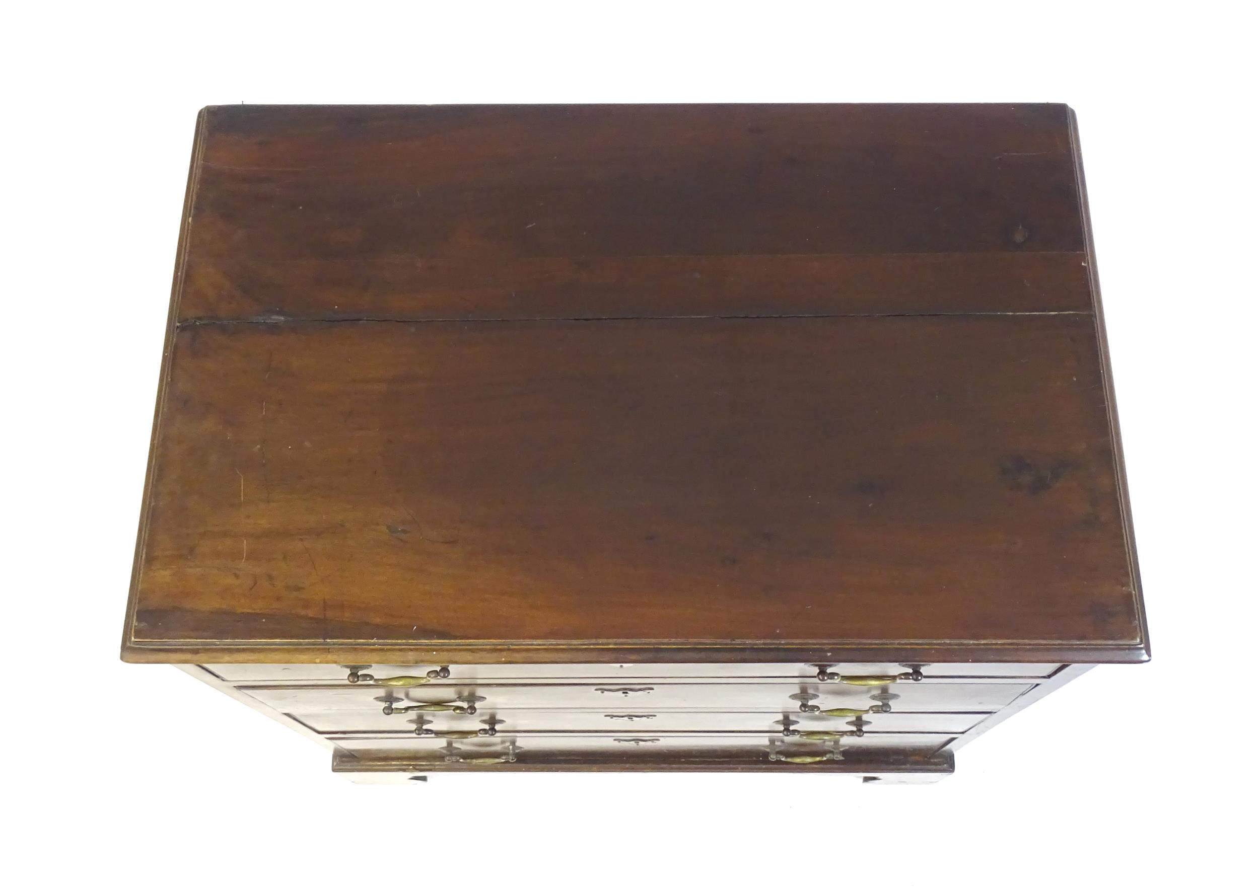 A late Georgian mahogany chest of drawers, having a rectangular moulded top above four long - Image 5 of 6