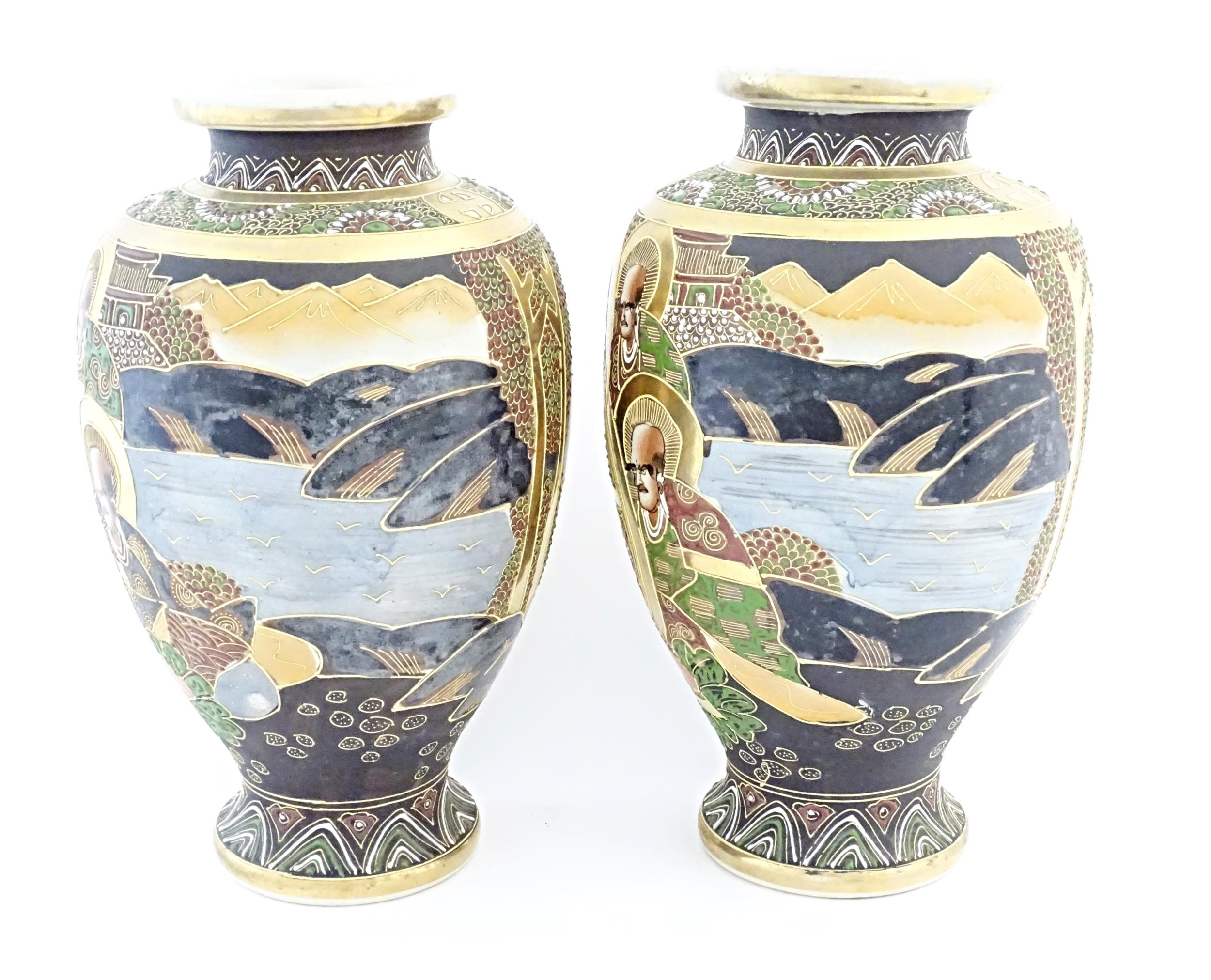 A pair of Japanese Satsuma vases of baluster form decorated with a central female figure bordered by - Image 4 of 11