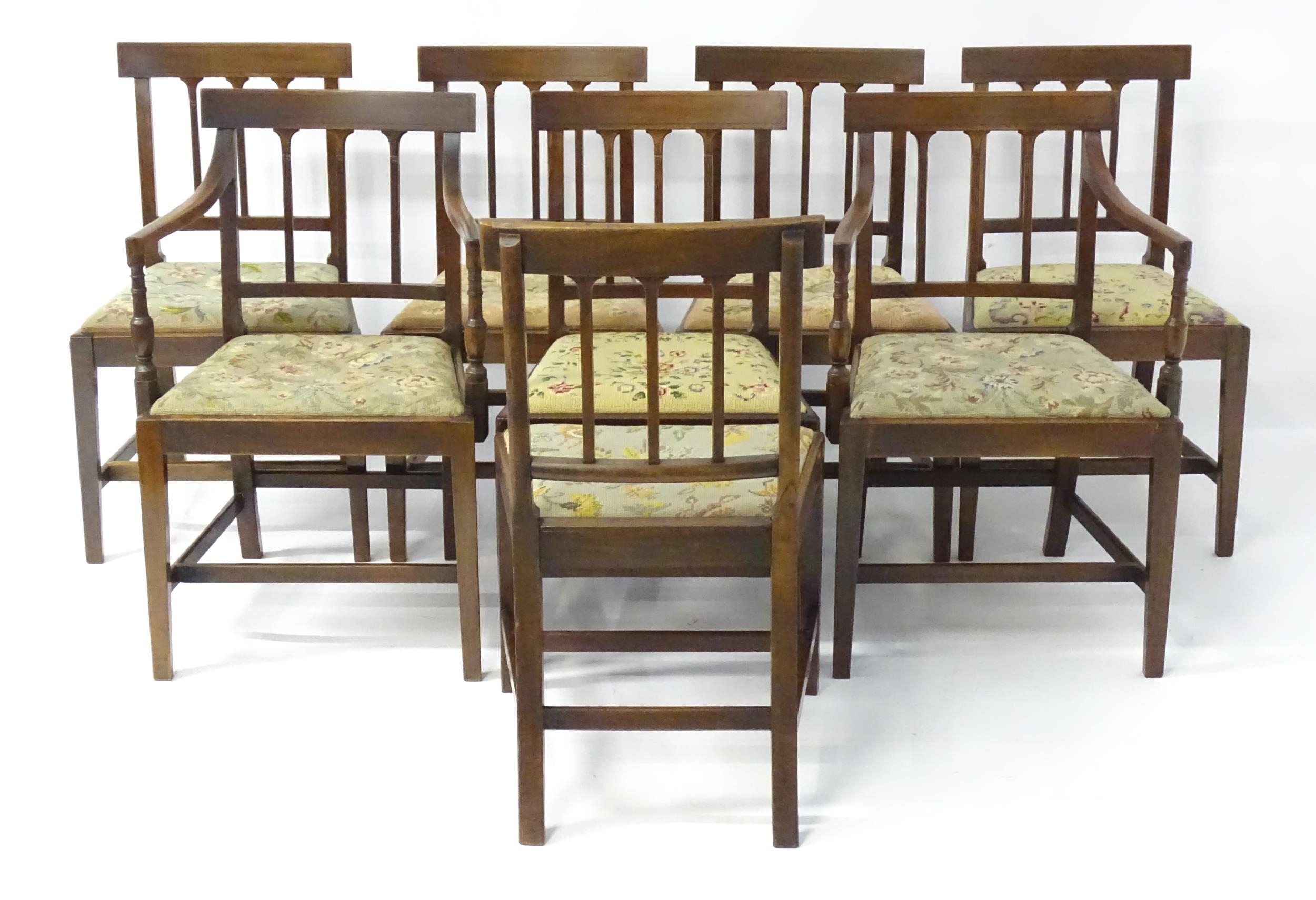 A set of eight Georgian mahogany dining chairs, having inlaid top rails above reeded back splats and - Image 2 of 12