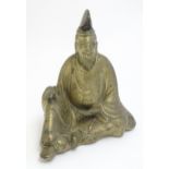 A 20thC Japanese cast model of a seated gentleman, possibly the scholar Sugawara no Michizane.