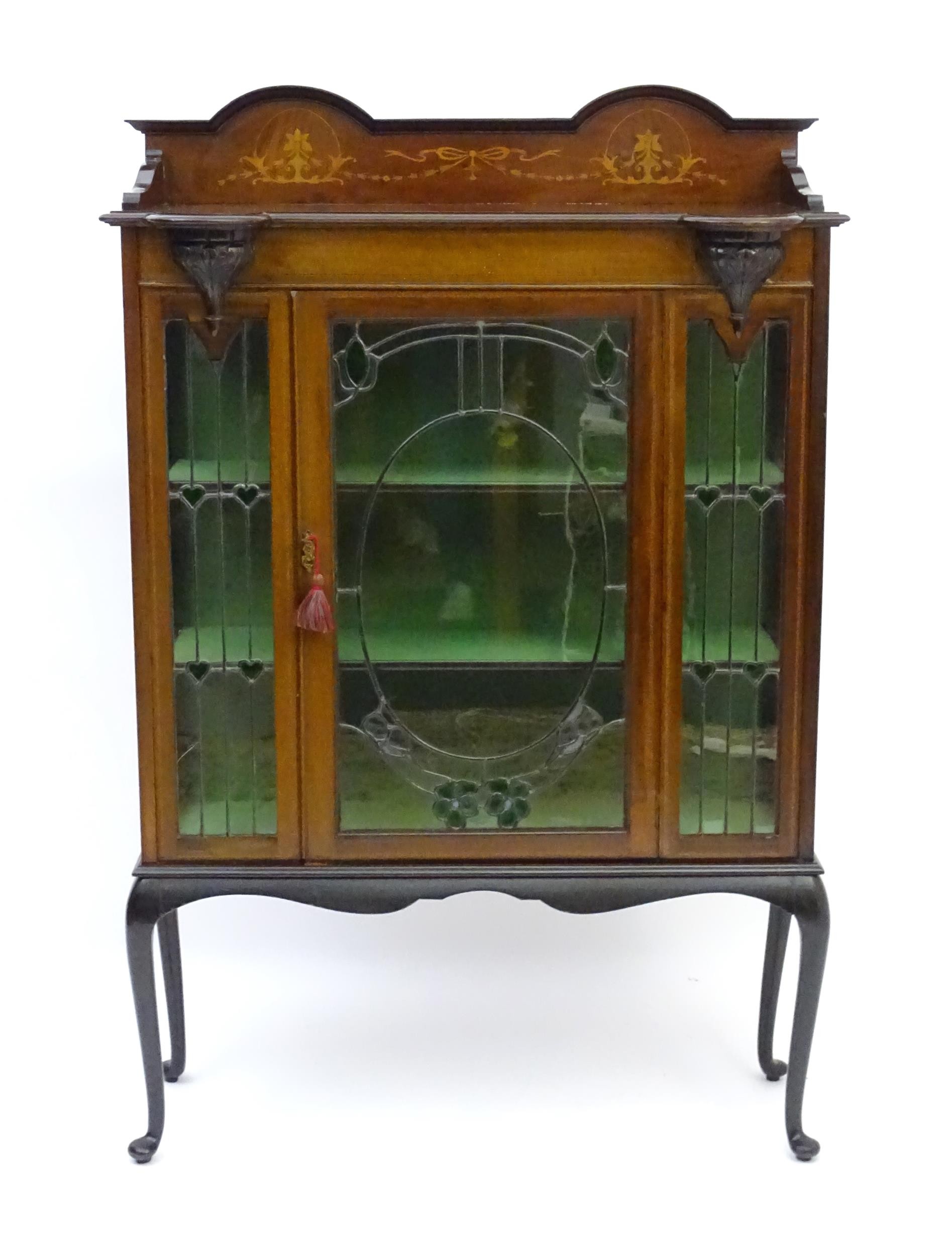 An Edwardian mahogany display cabinet with leaded glass panelling, stained glass panels and a - Image 5 of 12