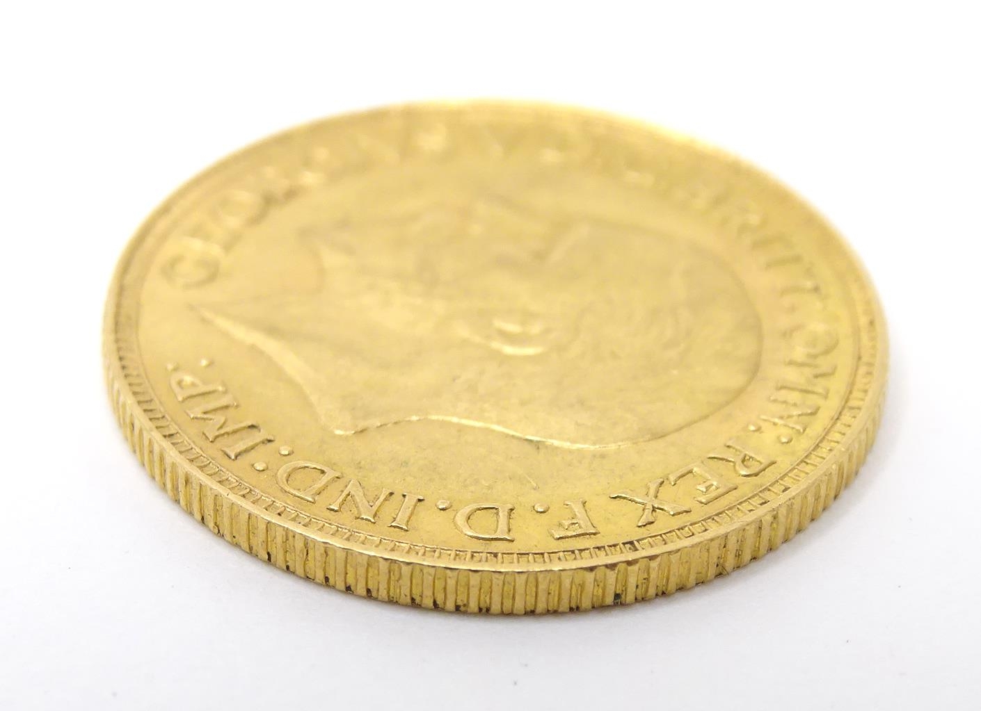 Coin : A George V 1929 gold sovereign coin. Total weight approx. 8g Please Note - we do not make - Image 5 of 5