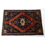 Carpet / Rug : A North west Persian Zanjan rug, the dark ground with geometric motifs Approx. 68"
