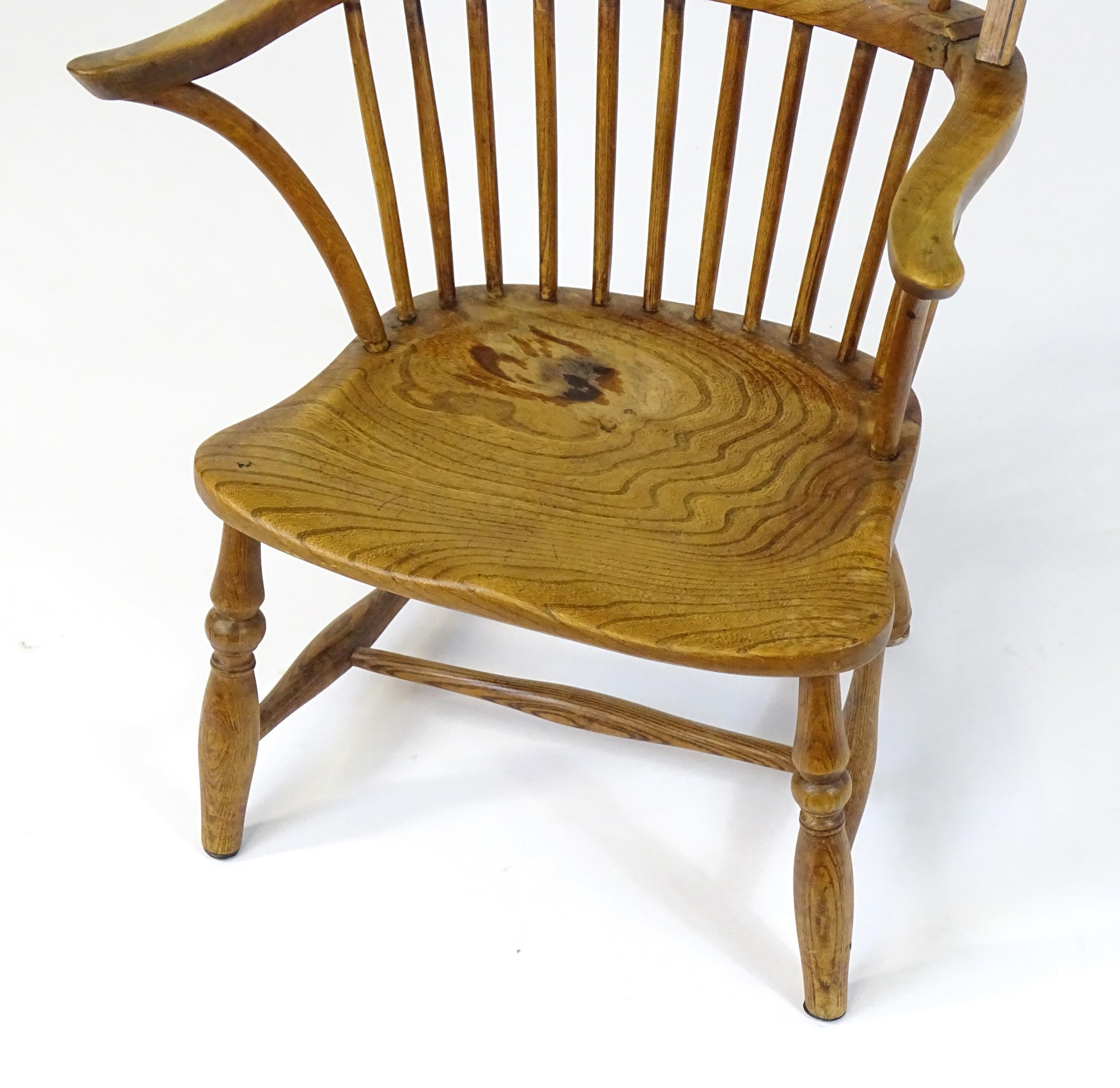 An early / mid 19thC Windsor chair of ash, elm and beech construction, having a double bow back, - Image 3 of 9