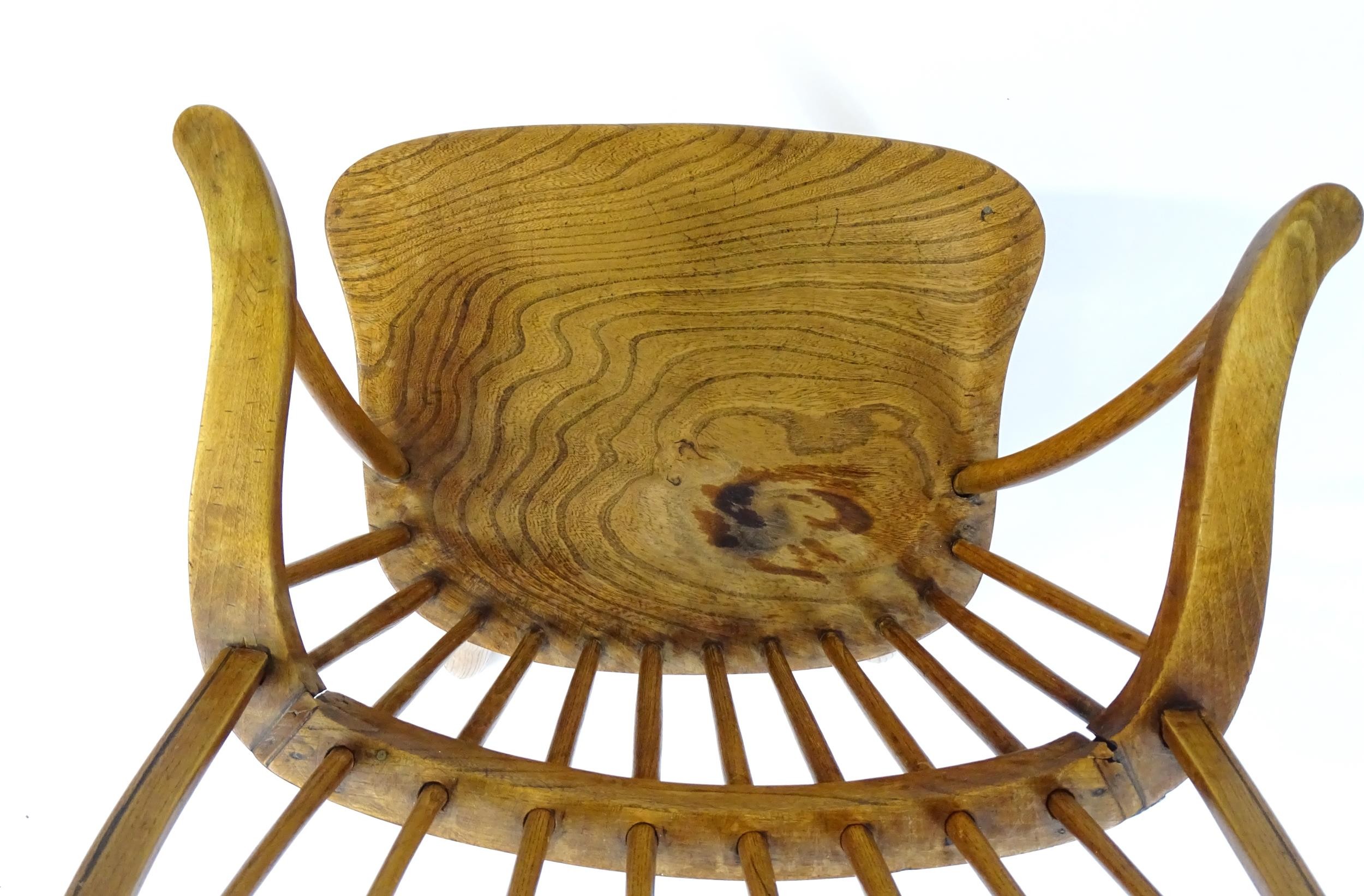 An early / mid 19thC Windsor chair of ash, elm and beech construction, having a double bow back, - Image 6 of 9