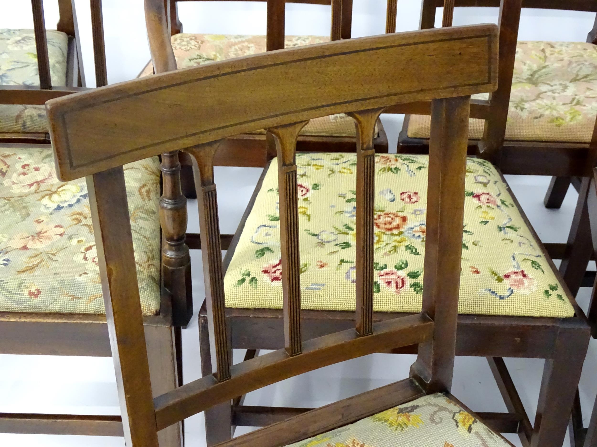 A set of eight Georgian mahogany dining chairs, having inlaid top rails above reeded back splats and - Image 10 of 12