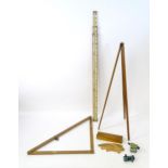 Mid to late 20thC surveyor's tools, comprising tripod, retractable measuring level, a boxed quantity
