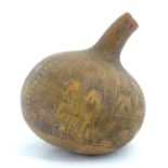 Ethnographic / Native / Tribal: An African gourd vase with incised decoration depicting elephants,