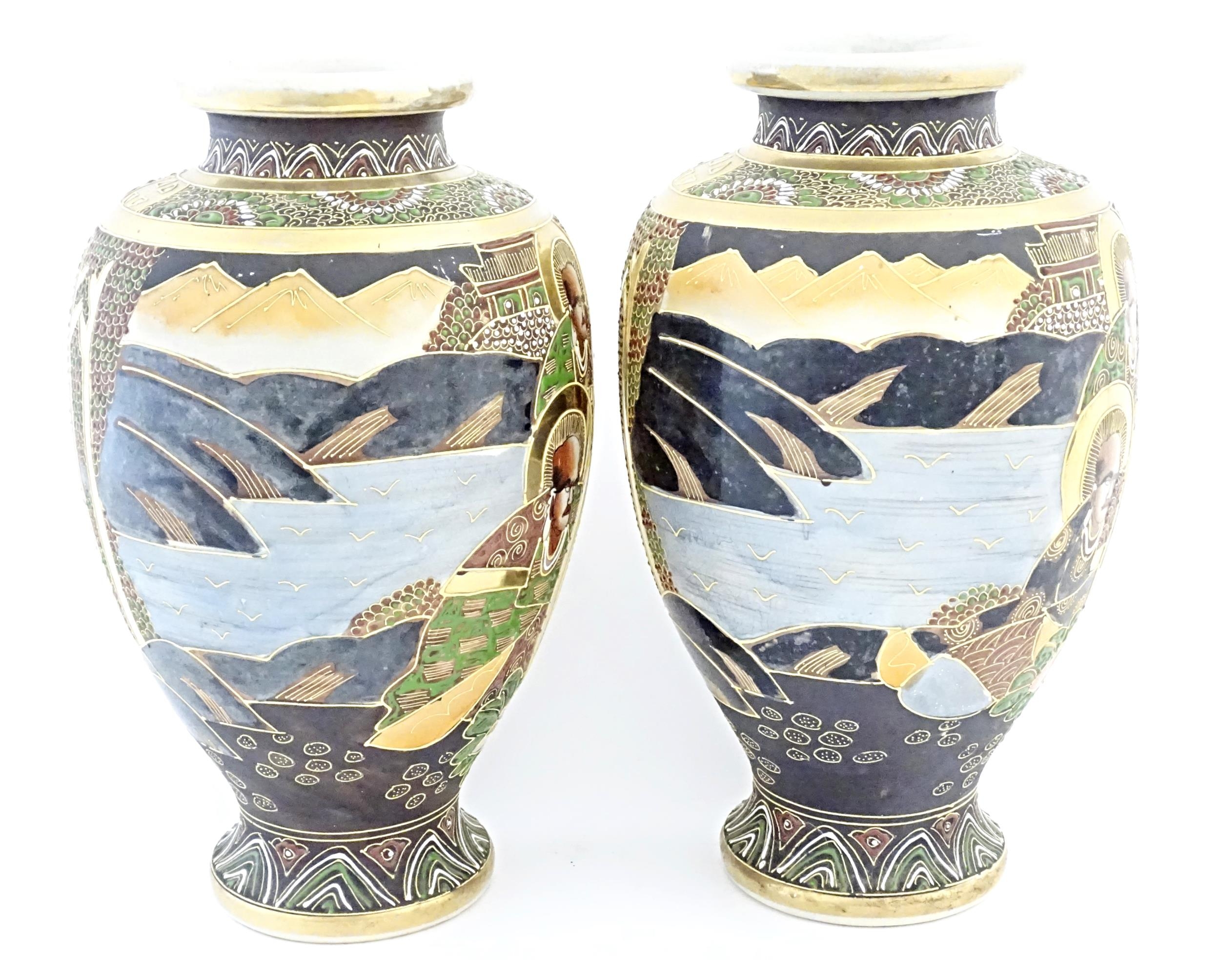 A pair of Japanese Satsuma vases of baluster form decorated with a central female figure bordered by - Image 6 of 11