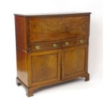 A 19thC continental mahogany escritoire, with a rectangular moulded top above a fall front above two