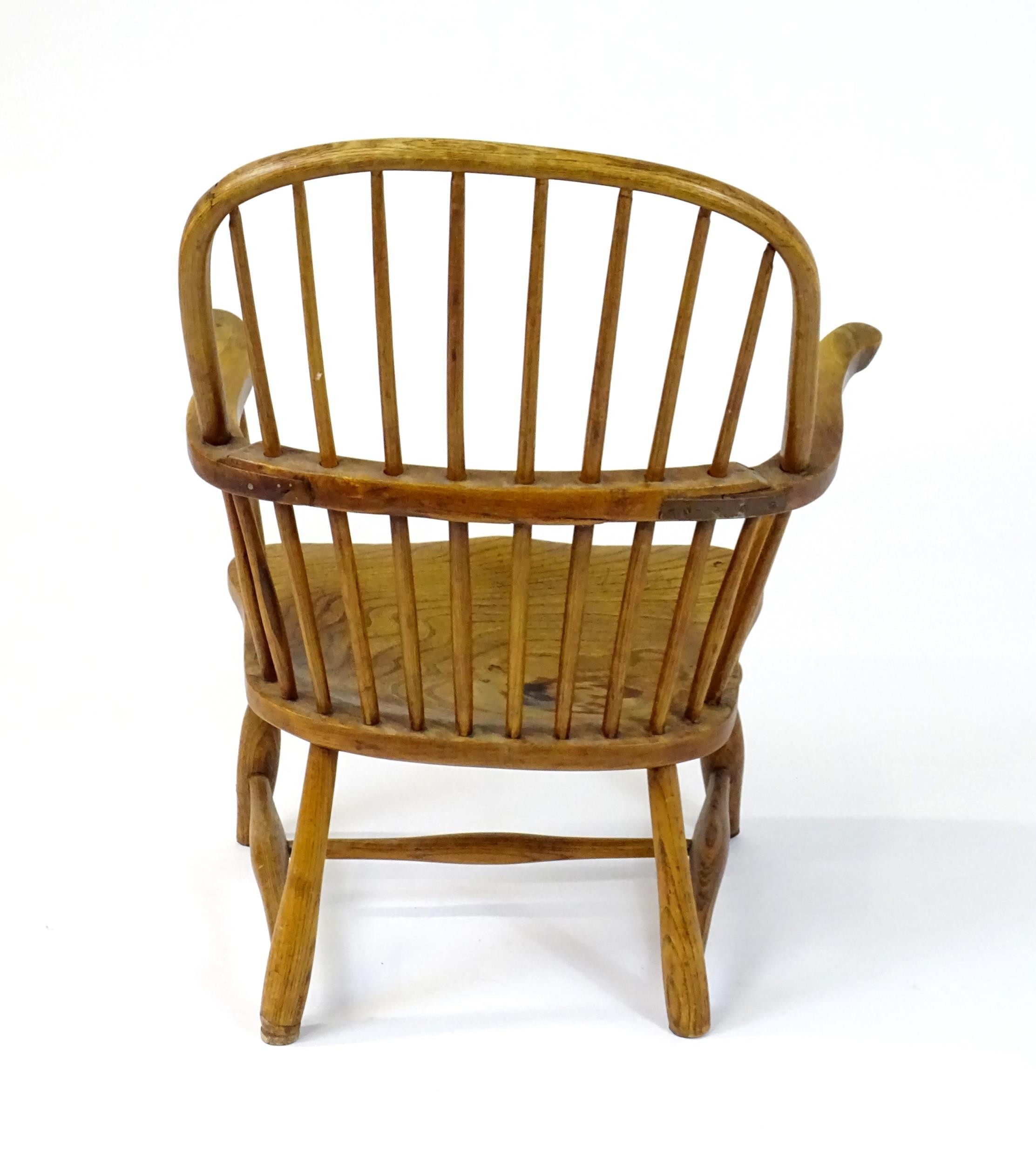 An early / mid 19thC Windsor chair of ash, elm and beech construction, having a double bow back, - Image 7 of 9