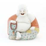 A large Chinese model of a laughing Buddha. Character marks under. Approx. 15" high Please Note - we