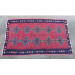 Carpet / Rug : A South West Persian Qashgai Kilim, the red ground with geometric repeated motifs.