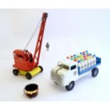 Toys: A tinplate Triang Hi-way Milk Float / truck with milk bottles, boxed. Together with a Tri-