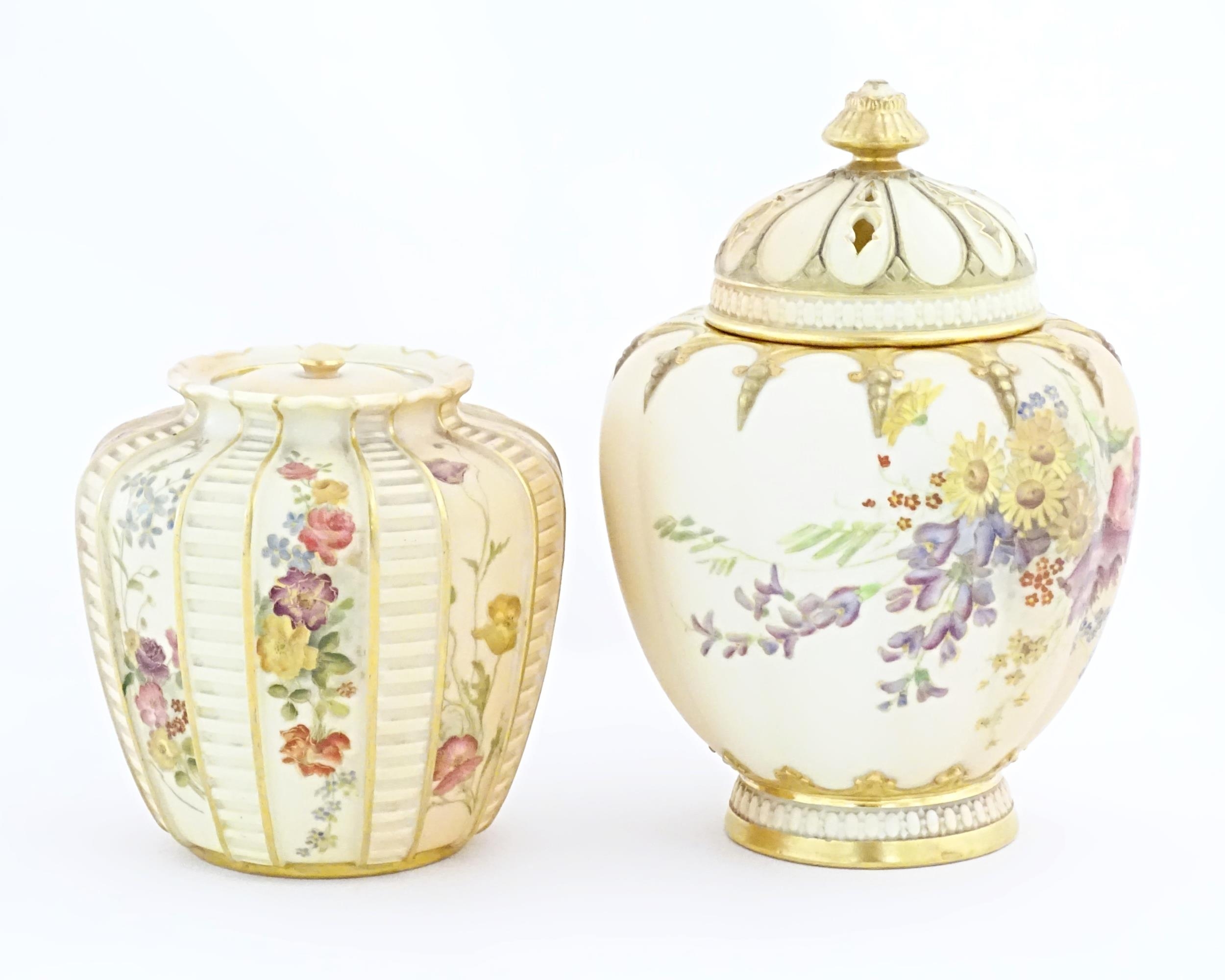 A Royal Worcester blush ivory pot pourri jar / vase and cover of lobed form decorated with flowers