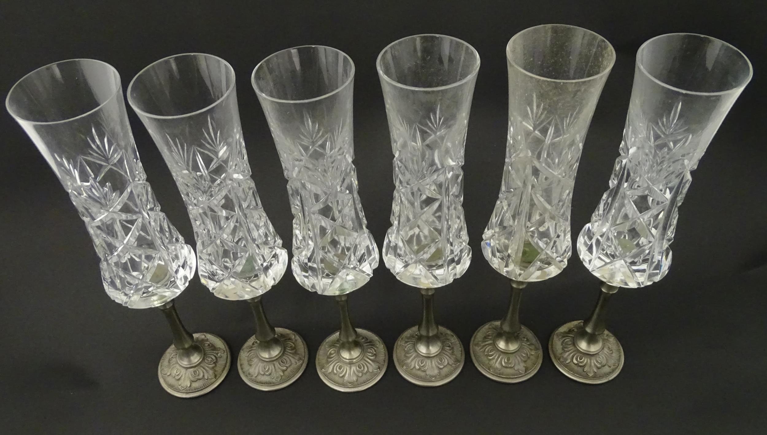 A set of six Italian cut glass champagne flutes raised on pewter stem and foot. Approx 11" high ( - Image 3 of 8