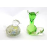 An Art glass model of a bird together with a Murano style green glass model of a fox. The fox approx