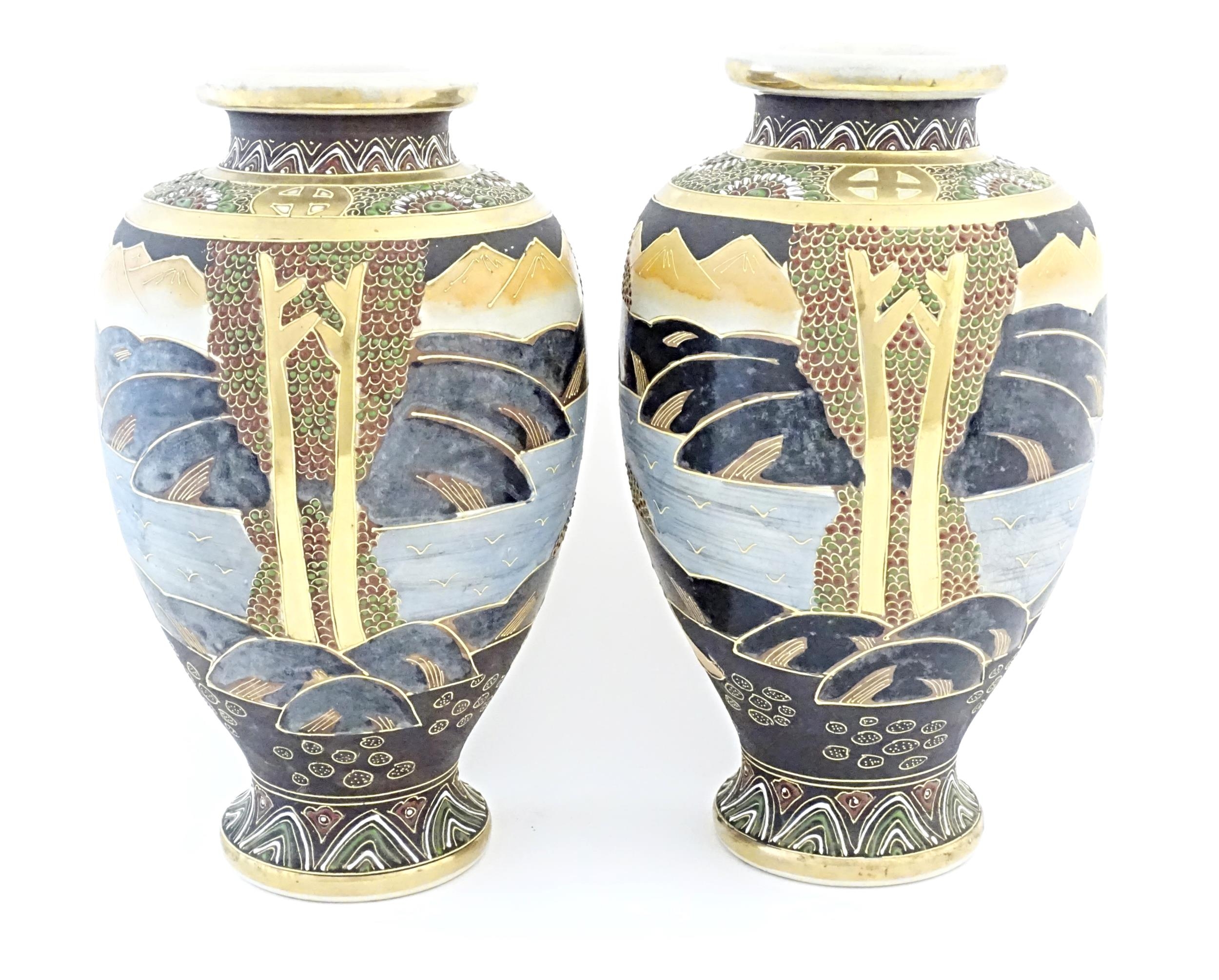 A pair of Japanese Satsuma vases of baluster form decorated with a central female figure bordered by - Image 5 of 11