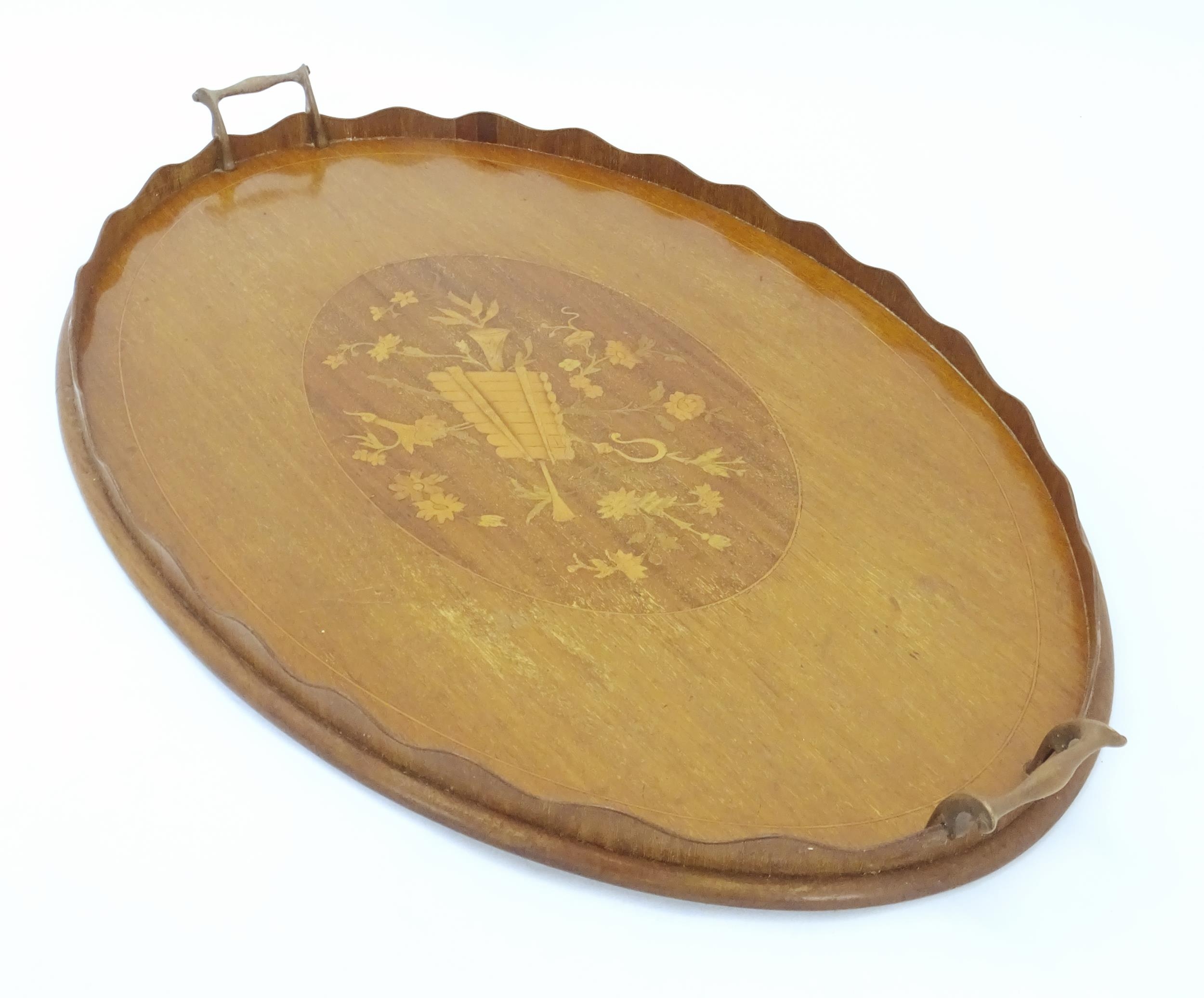 A late 19th / early 20thC mahogany tray of oval form with twin handles and central floral and - Image 3 of 5